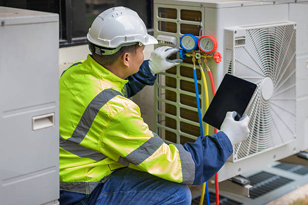 Professional Emergency Ac Repair technician working in Bellville, OH